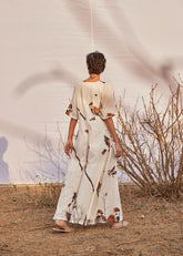 A Model Wearing White Cotton Mul GhironiJumpsuit,curated by Only Ethikal